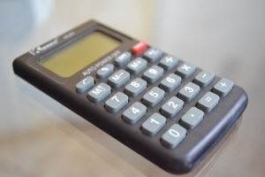 Image of a calculator, to represent the division of debts in an NJ divorce